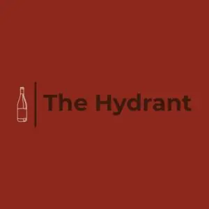 Logo with a wine bottle icon to the left and the text "The Hydrant" in bold letters on a solid maroon background.