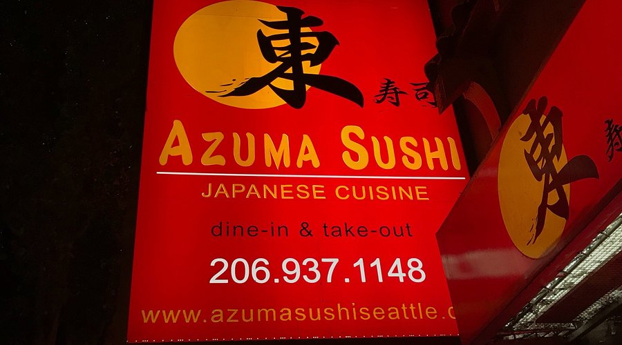 Red sign for Azuma Sushi Japanese Cuisine with a phone number, website, and options for dine-in and take-out. Large Japanese character and yellow circle are displayed at the top.